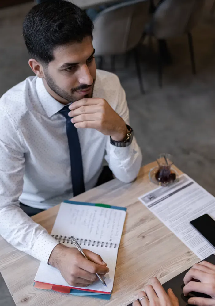 A hiring consultant reviewing candidate notes