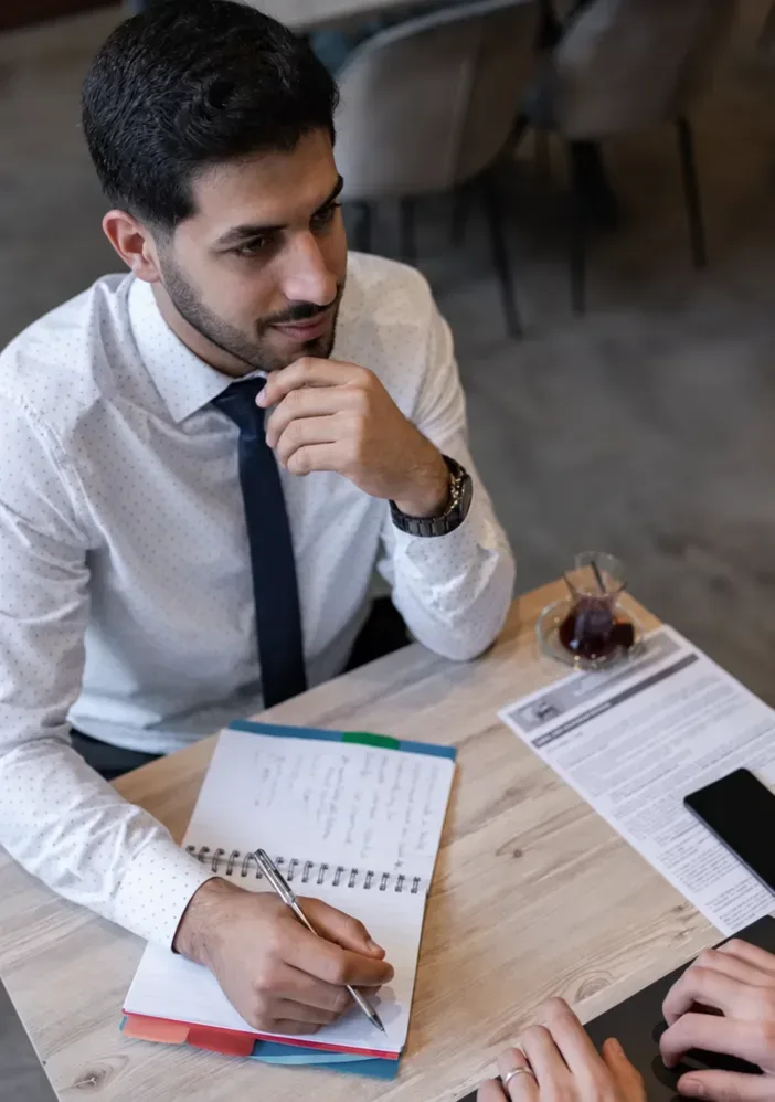 A candidate discussing his experience during an interview